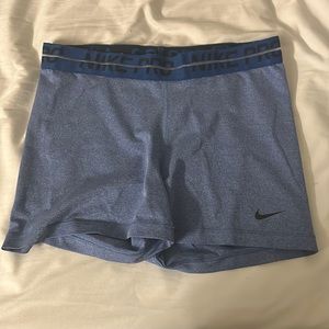 Light blue nike pros